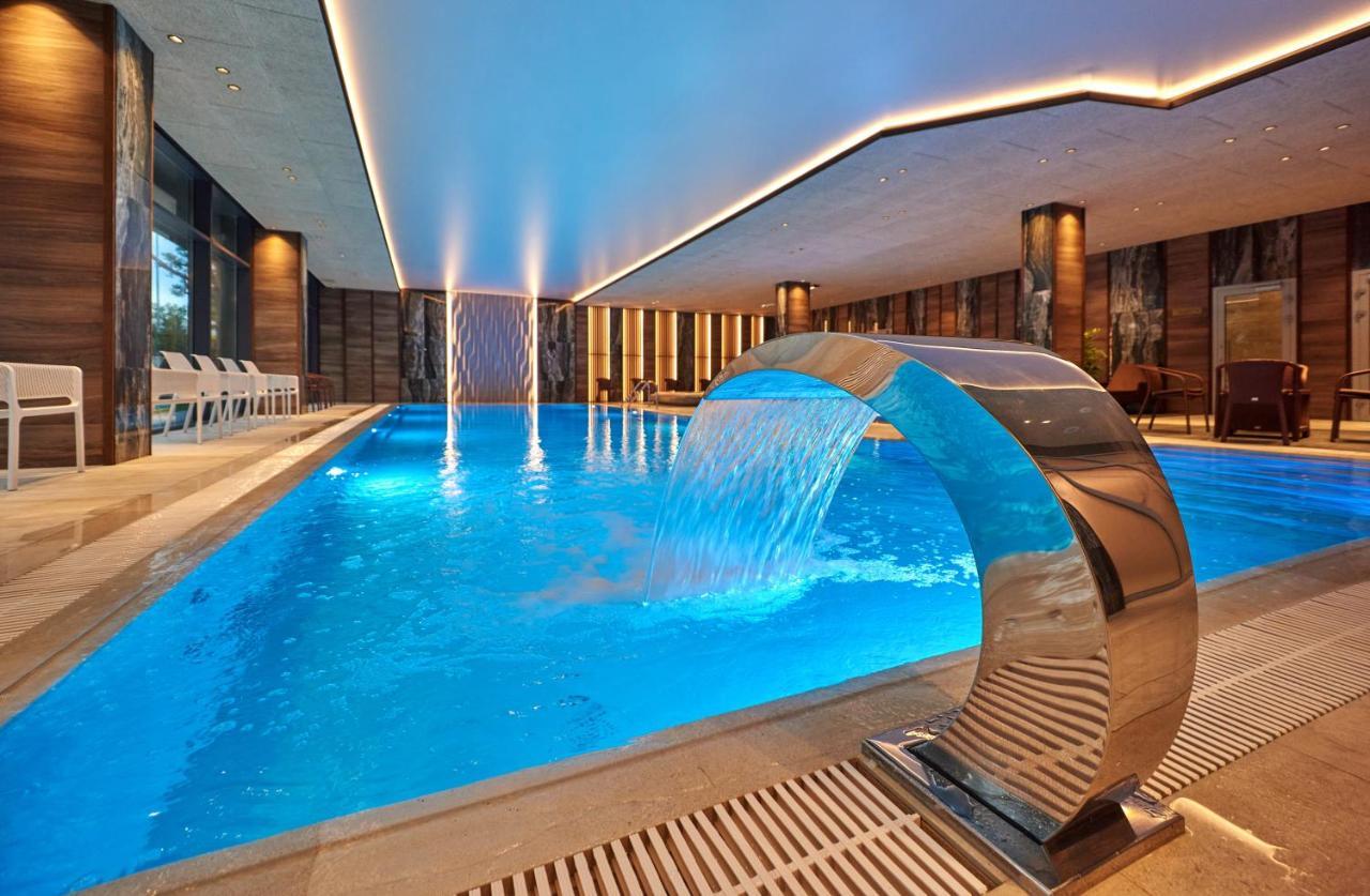 Premier Hotel Odessa Exteriör bild The swimming pool at the hotel